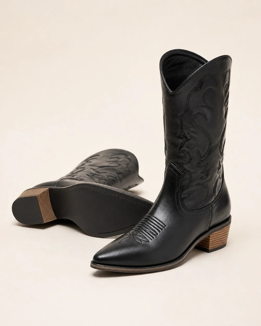 Women's Arabella black western cowboy boots, clean product view.