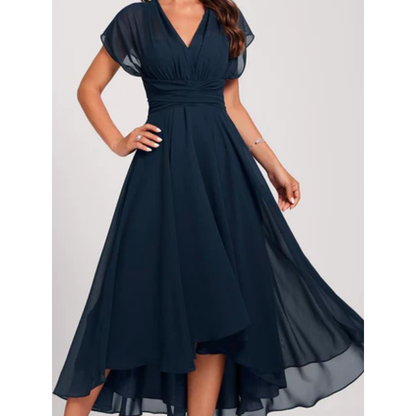 Thessalonia | Vestido de Gasa con Escote en V y Bajo Asimétrico – Elegante