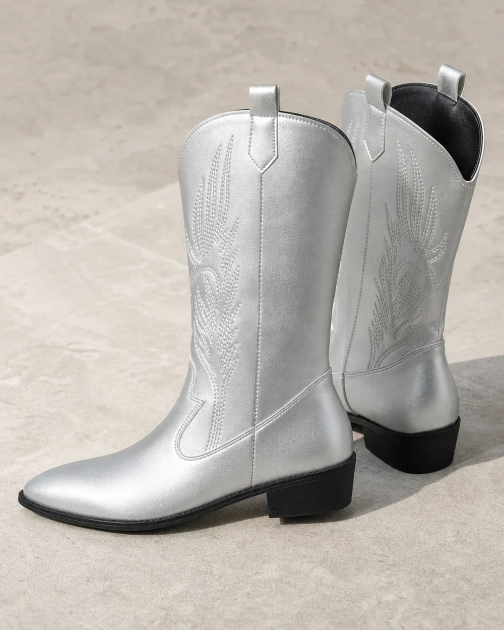 Women's Amelia silver cowboy boots, profile and embroidery detail.