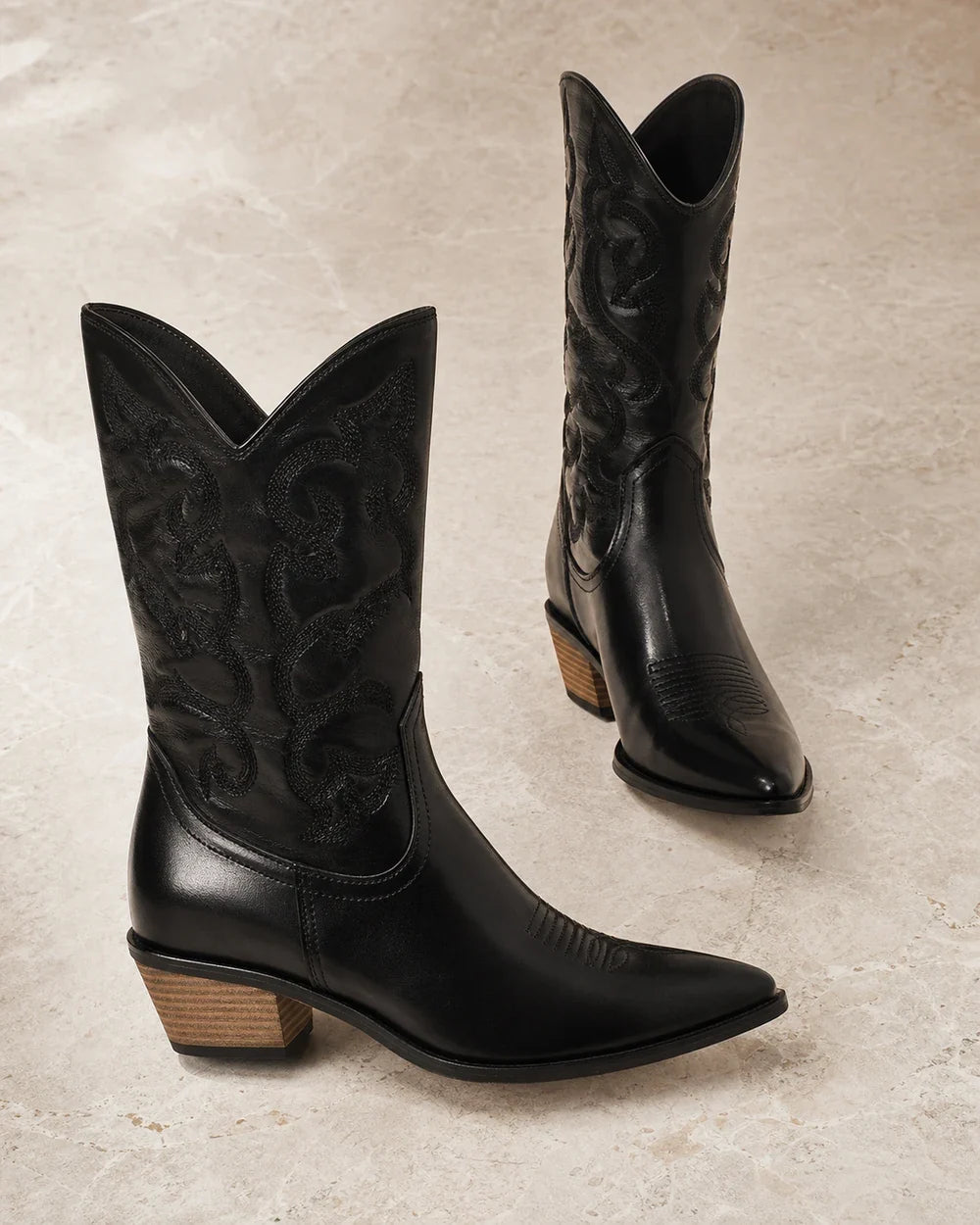 Women's Arabella black western boots, clean side profile.