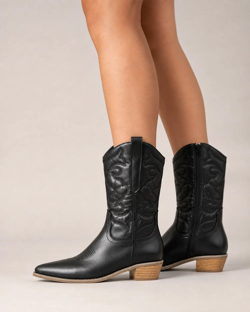 Women's Evelyn black western boots, clean side profile.