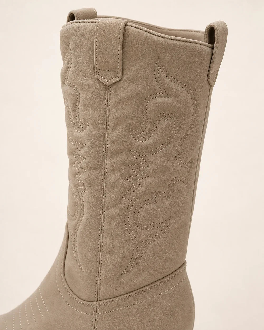 Women's Gracia sand boot, embroidery and pull-tab detail.