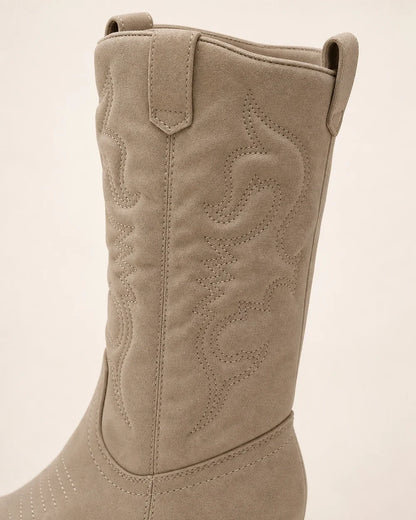 Women's Gracia sand boot, embroidery and pull-tab detail.