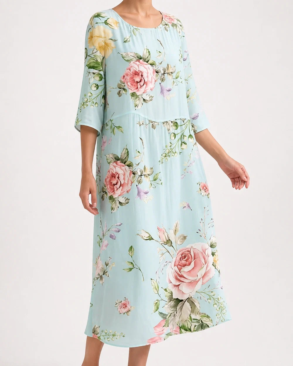 Women's pale blue floral midi dress, three-quarter worn view