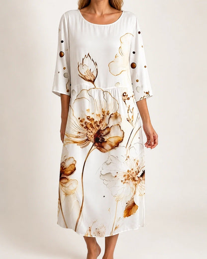 Women's white botanical floral loose midi dress, worn view