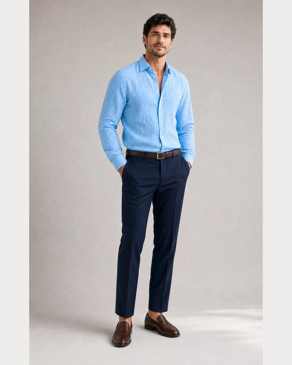 Men's light blue long-sleeve summer shirt, smart tucked styling.