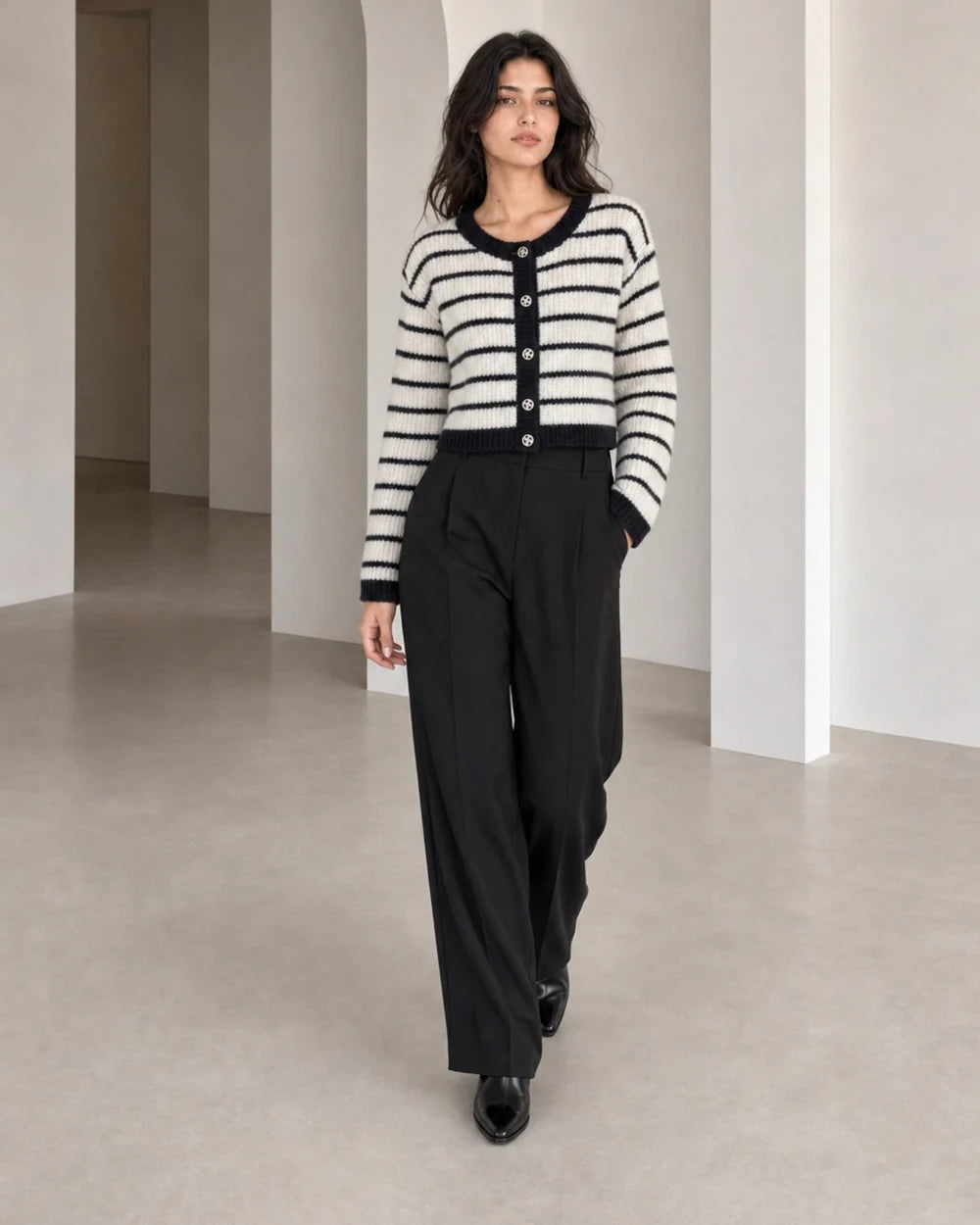 Momount cream and black striped cardigan, walking movement view