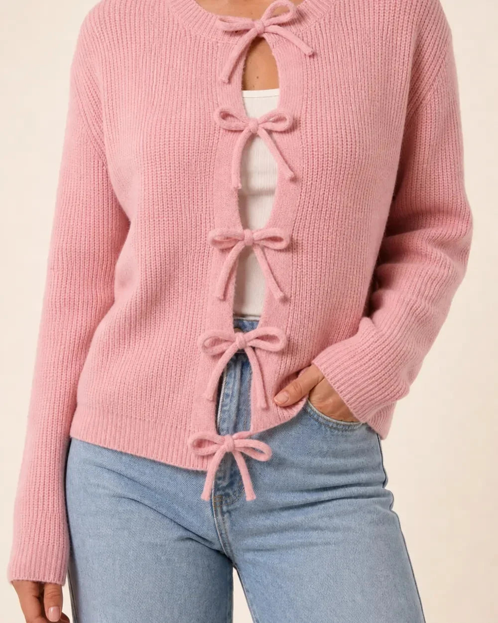 Pink tie-front ribbed cardigan for women, front hero view.