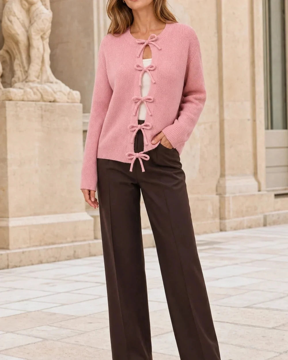 Pink cropped tie-front cardigan, complete silhouette.