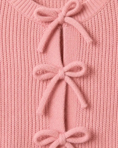 Close-up of the pink rib knit and tonal bow ties.