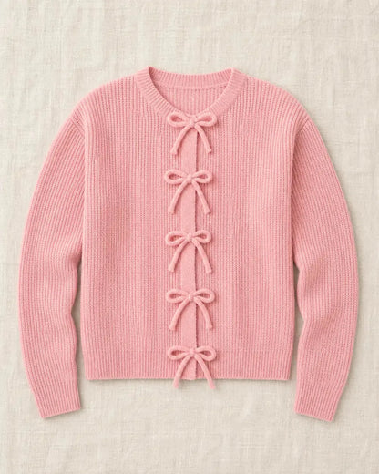 Pink ribbed tie-front cardigan, clean product-only flat lay.