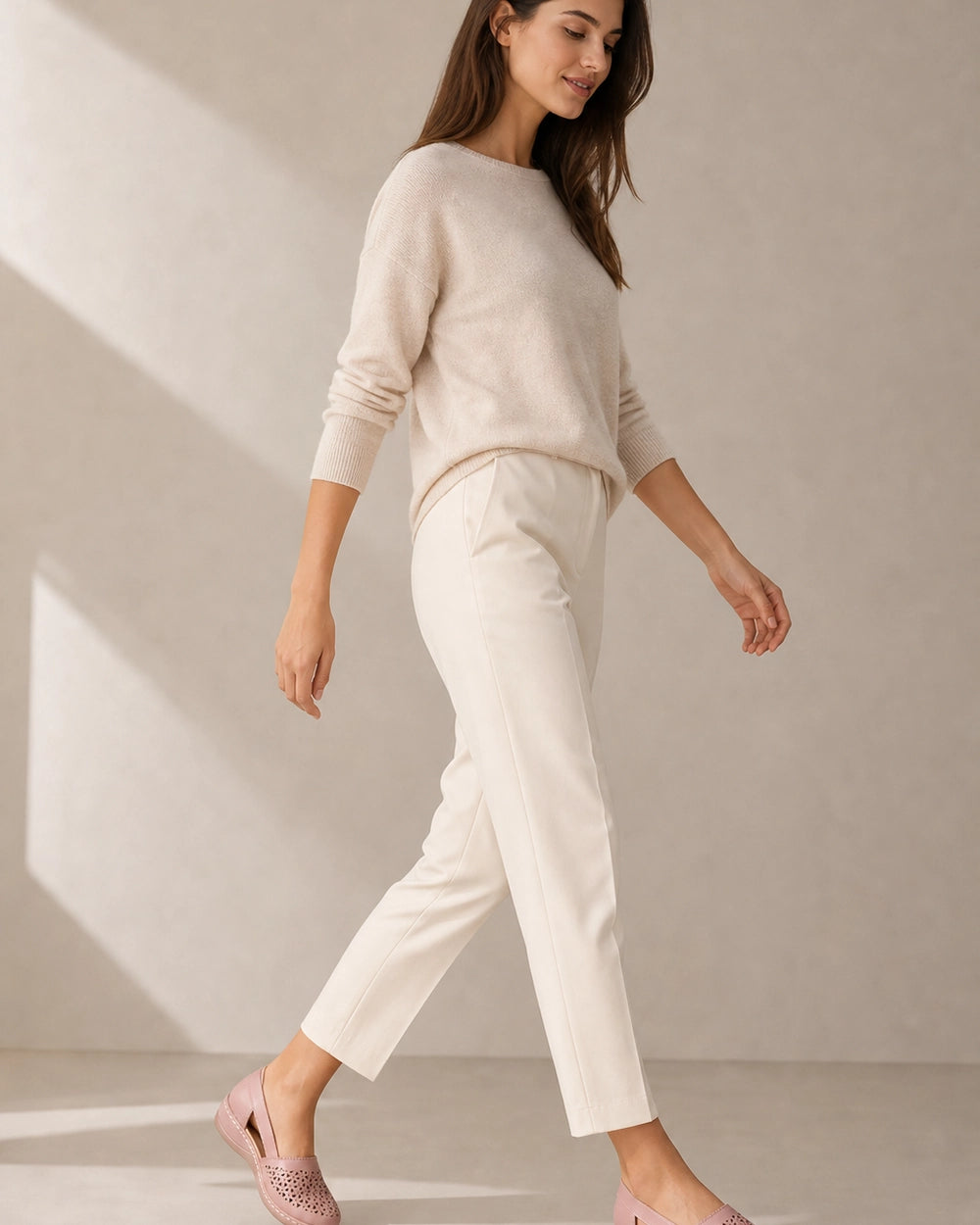 Women's light pink slingback comfort shoes, full styled silhouette.