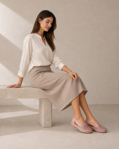 Women's light pink comfort shoes, alternate skirt styling.