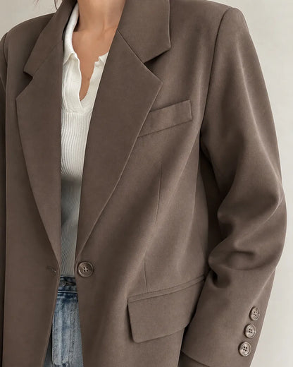 Momount women's oversized coffee brown blazer, lapel, pocket and cuff details.