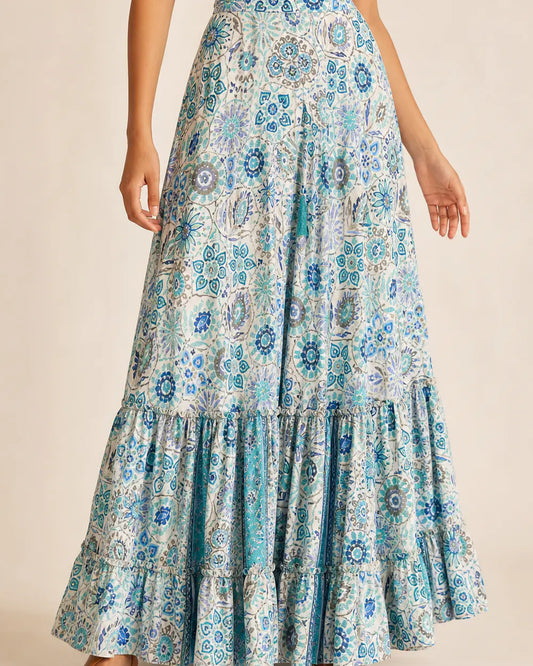 Women’s Blue Floral tiered maxi skirt, front three-quarter product view.