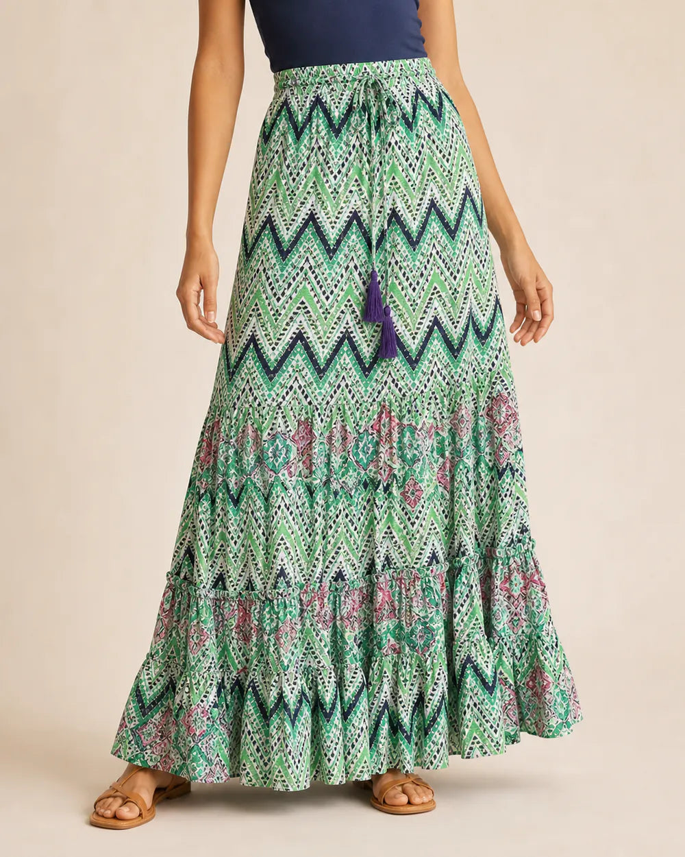 Women’s Green printed tiered maxi skirt, front product view.