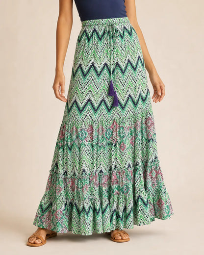 Women’s Green printed tiered maxi skirt, front product view.