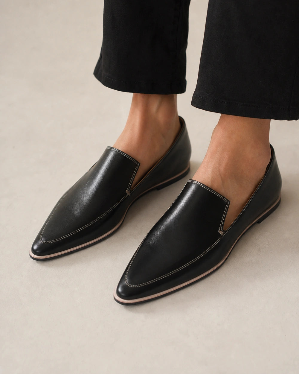 MINIMALIST-POINTED-QUALITY-REMAKE-2026-07-22 — pointed-toe-loafers-leather-slip-on-soft-flat-minimalist-black-01-worn-hero.webp