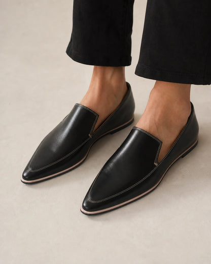 MINIMALIST-POINTED-QUALITY-REMAKE-2026-07-22 — pointed-toe-loafers-leather-slip-on-soft-flat-minimalist-black-01-worn-hero.webp