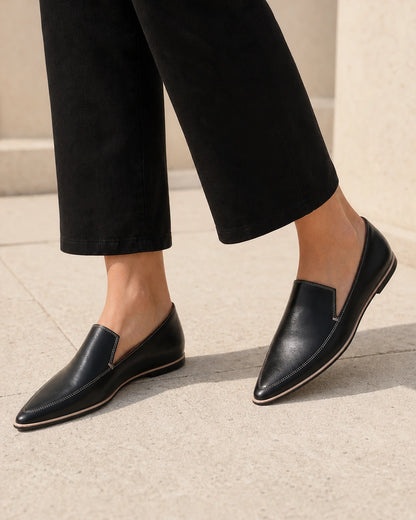MINIMALIST-POINTED-QUALITY-REMAKE-2026-07-22 — pointed-toe-loafers-leather-slip-on-soft-flat-minimalist-black-06-walking.webp