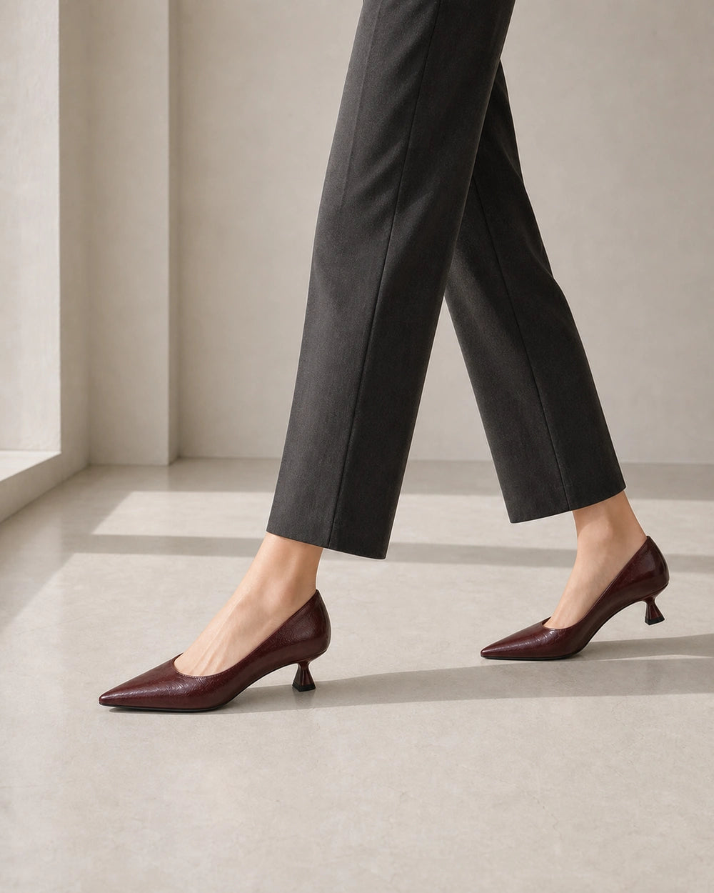 Glossy Leather Pointed Toe Kitten Heel Pumps, brown movement. — sadie-brown-06-movement.webp