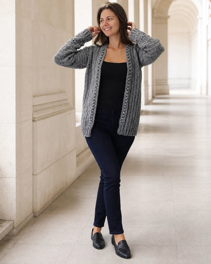 Grey openwork crochet cardigan for women, complete silhouette.
