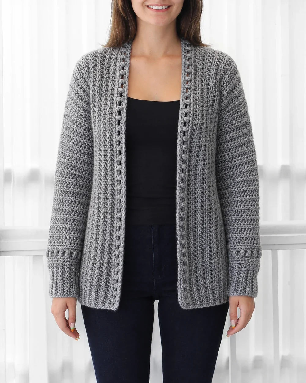 Grey bobble-texture long-sleeve cardigan, straight front fit.