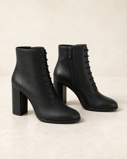 Women's black lace-up high-heel ankle boots, product-only view.