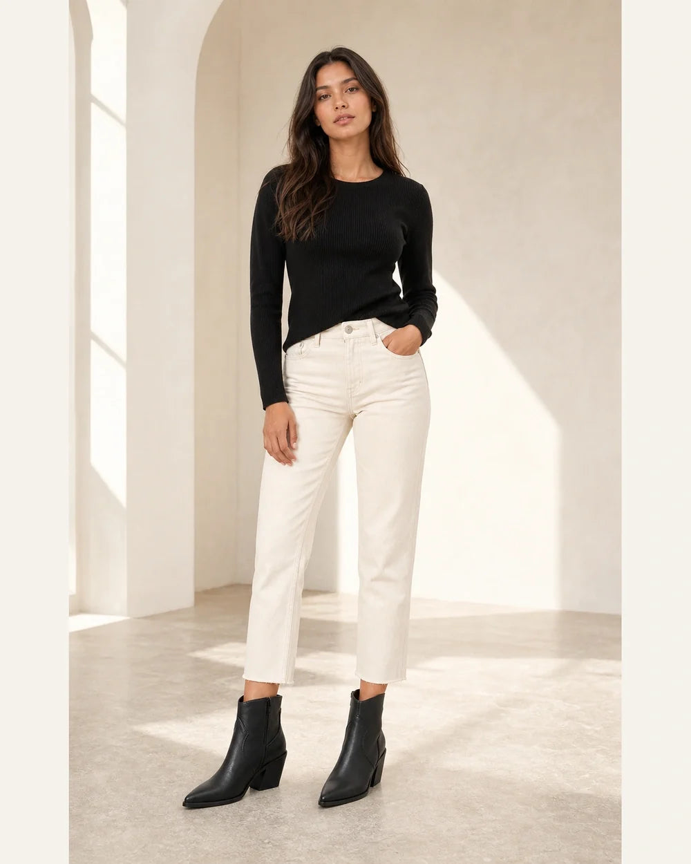 Black pointed western ankle boots, complete silhouette without distortion.