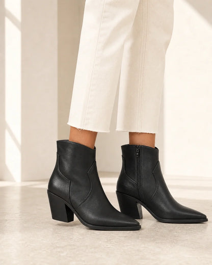 Women's black pointed western ankle boots, lateral profile.