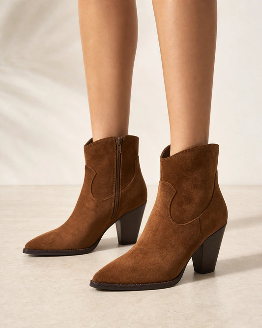 Women's brown suede-effect western ankle boots, front three-quarter view.