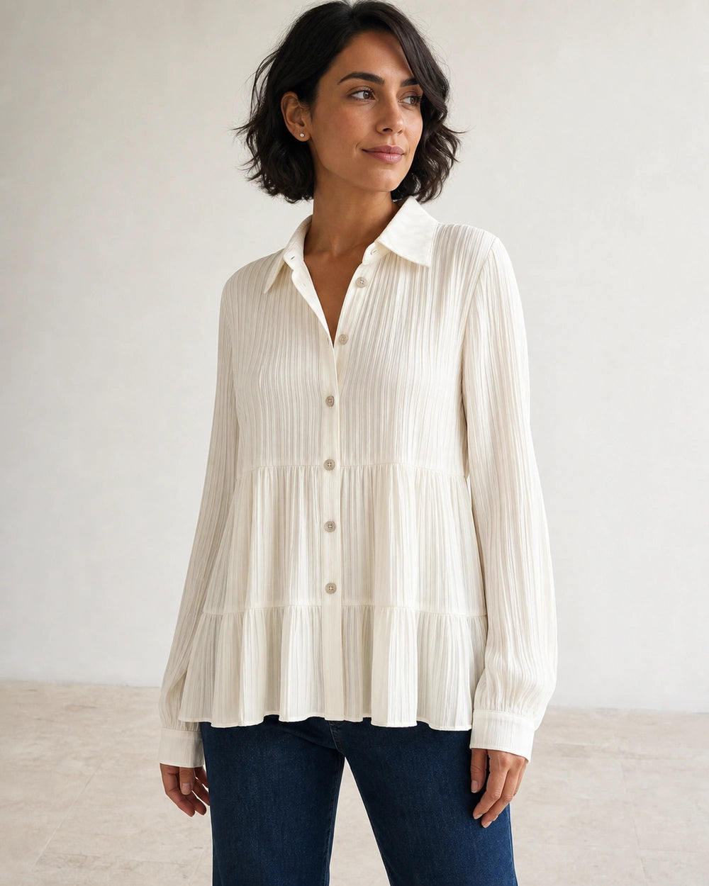Women's milk-white pleated peplum shirt, front product view.