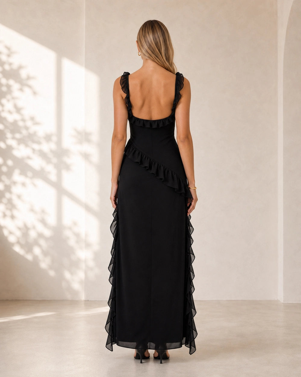 Women's black ruffled maxi dress, back view. — womens-ruffled-maxi-dress-front-slit-black-03-back.webp